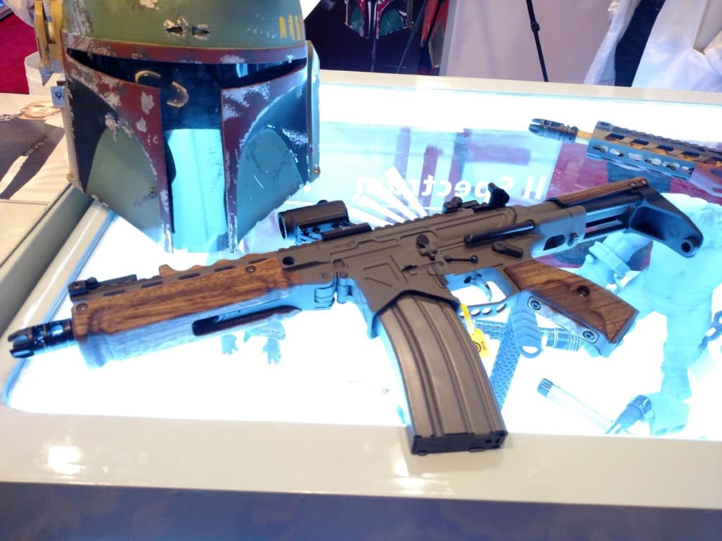 A short-barrel AR-15 on display at an industry trade show