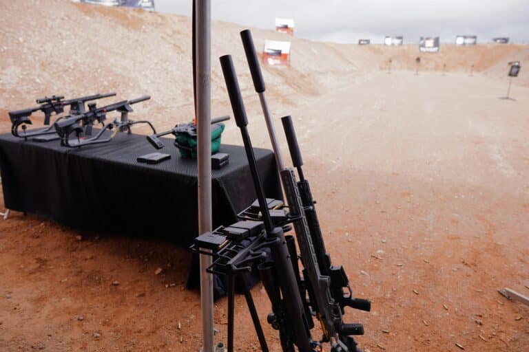 Suppressed rifles at a Nevada range during SHOT Show 2023