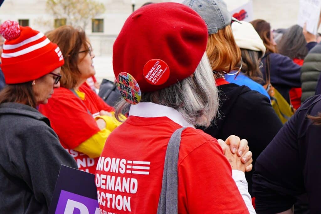 A Moms Demand Action member at a Supreme Court protest on November 7th, 2023