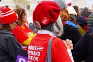 A Moms Demand Action member at a Supreme Court protest on November 7th, 2023