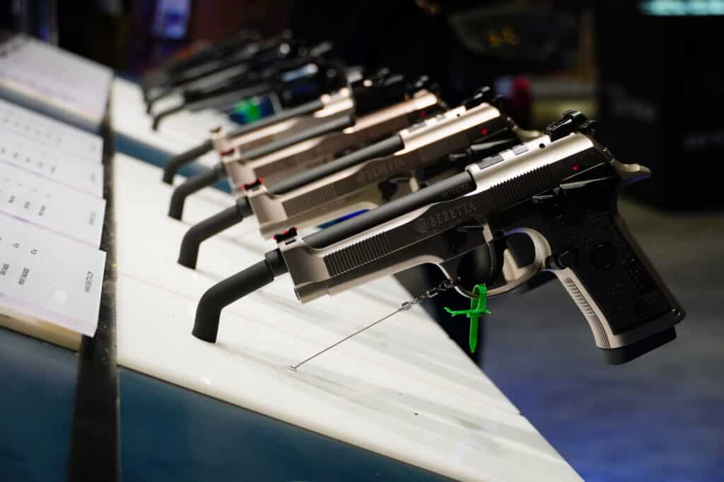 A selection of semi-automatic handguns on display at SHOT Show 2024