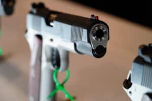 A 1991 pistol on display at the 2024 SHOT Show in Las Vegas, Nevada