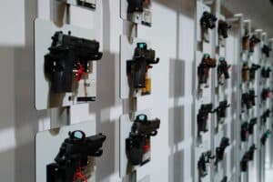 A wall of handguns on display at the 2024 NRA Annual Meeting