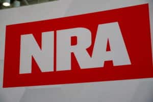 The NRA logo on a sign at the group's 2024 conference
