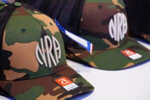 NRA hats on sale at the group's 2024 conference