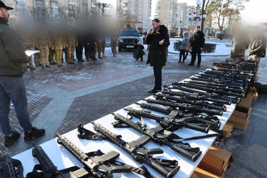 Weapons, handed over to the military in Irpin, January 2024. Maryan Zablotskiy is in the center