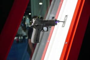 A semi-automatic handgun on display at the 2025 NRA Annual Meeting