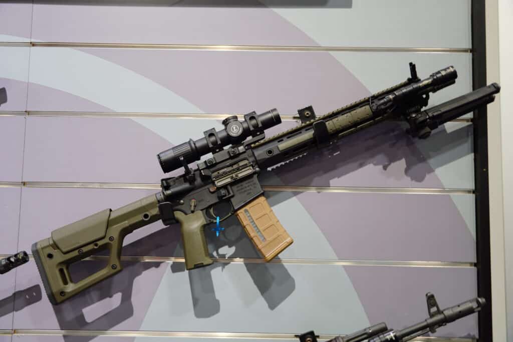 An AR-15 at a booth during the 2025 NRA Annual Meeting