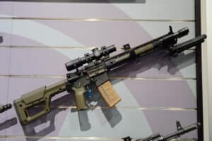 An AR-15 at a booth during the 2025 NRA Annual Meeting