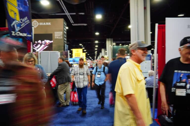 People explore the exhibit floor at the 2025 NRA Annual Meeting