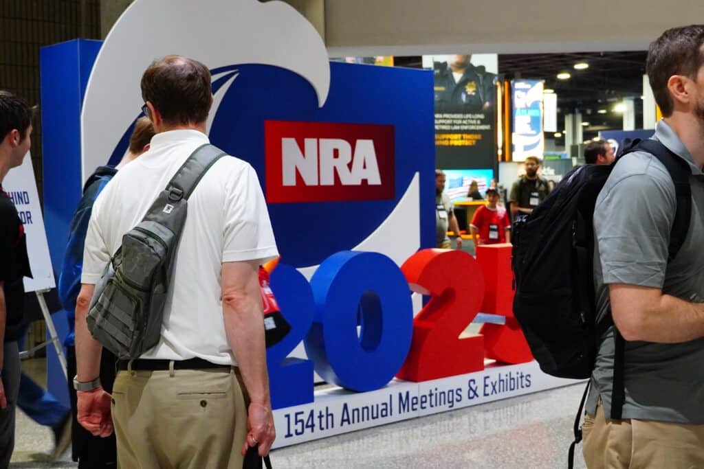 Attendees exit the exhibit floor at the 2025 NRA Annual Meeting
